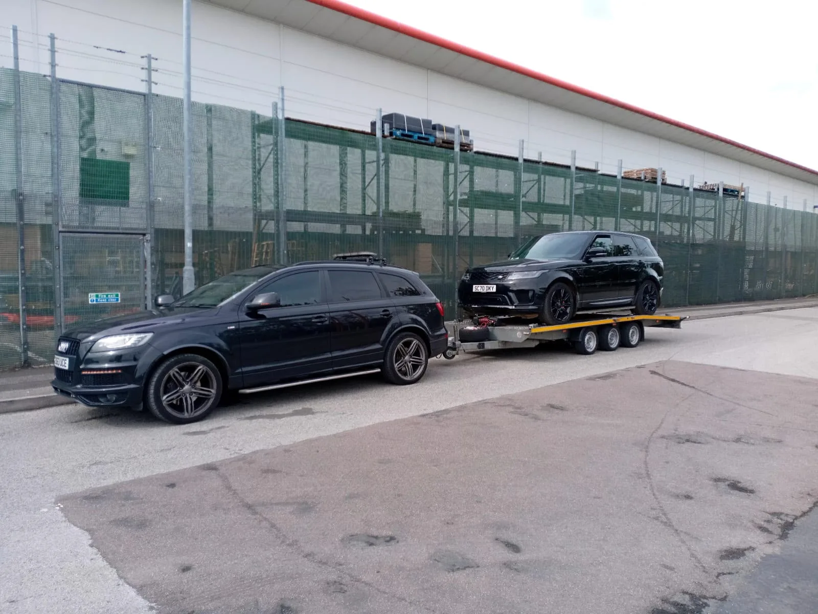 KYS Recovery transporting a Range Rover on a trailer